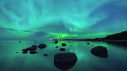 Northern lights (aurora borealis) lights up the sky over the Gulf of Finland. (Image credit: Shutterstock)